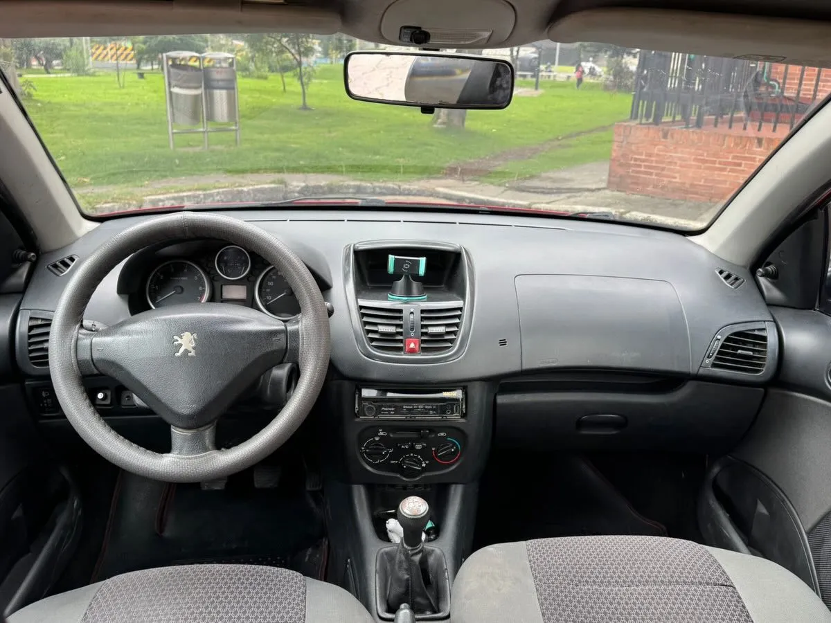 Peugeot 206 — foto 11